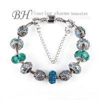 браслет в посеребрении с  кристаллами и муранским стеклом .